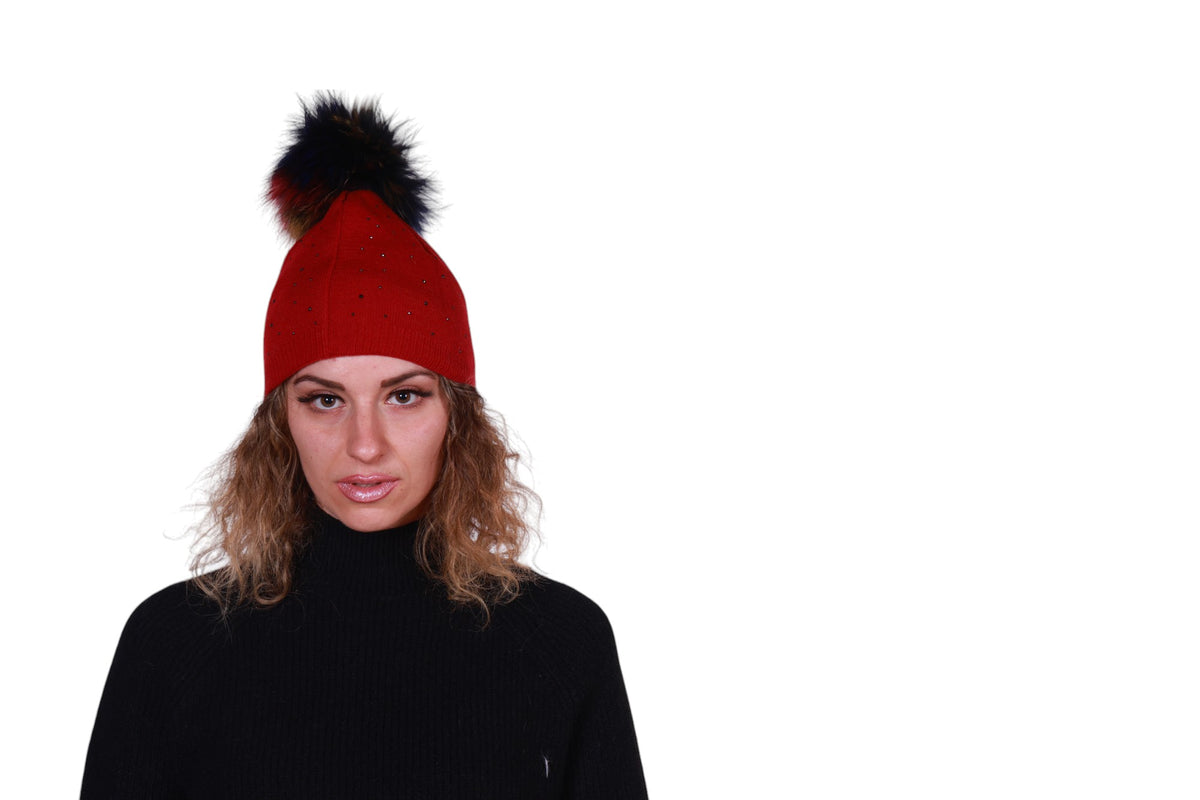 Cappello con pon pon multicolor e brillantini