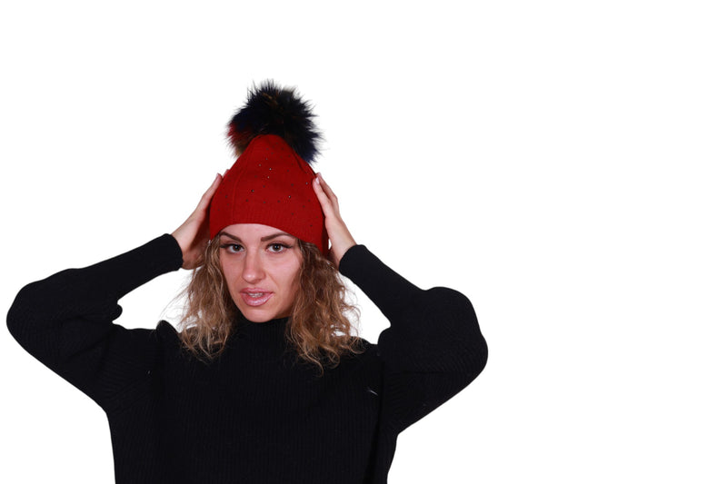 Cappello con pon pon multicolor e brillantini