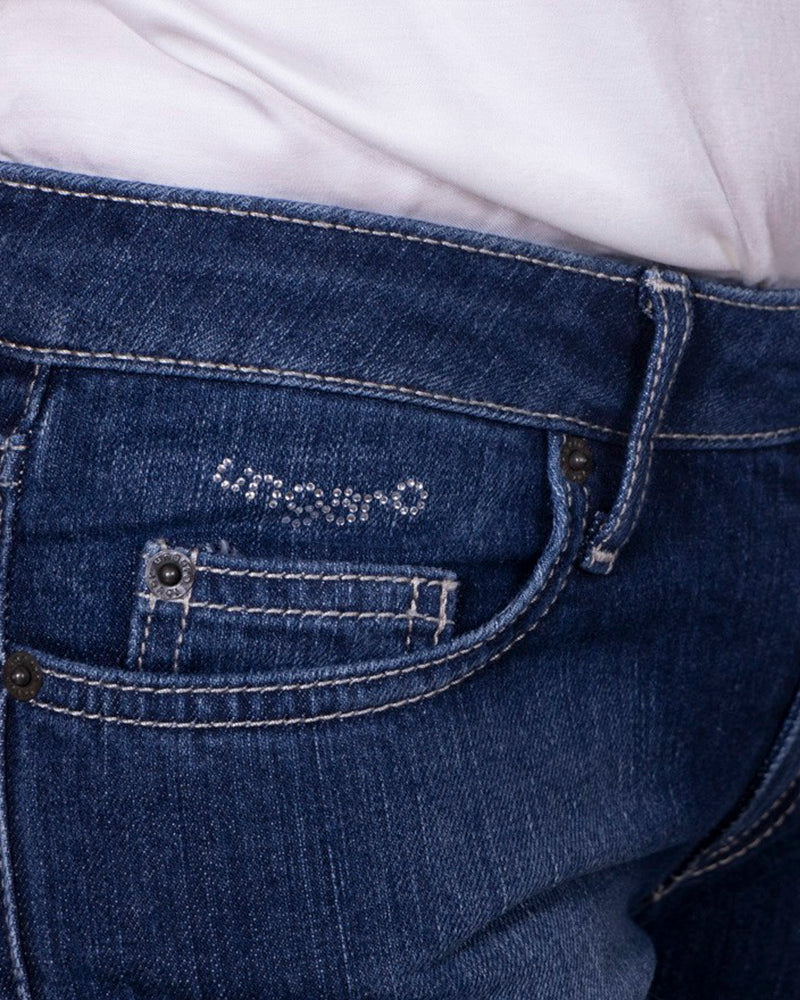 Jeans donna U/F bootcut a vita bassa in denim stretch con taglio svasato