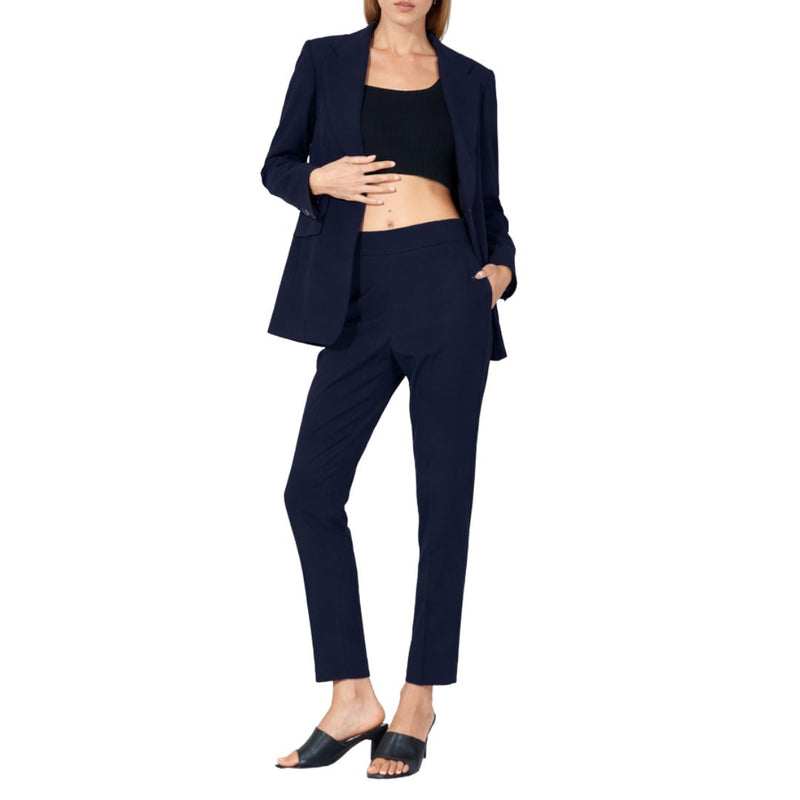 Completo donna giacca monobottone e finte tasche, pantaloni a sigaretta con zip