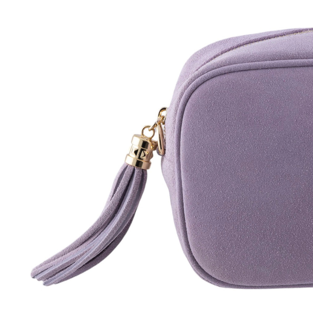 Borsa a tracolla vero camoscio, cursore a frangia laterale e chiusura con zip